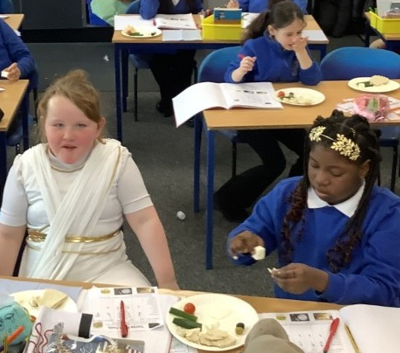 Photo of children trying Greek food