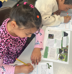 Photo of children showing Endangered Species Day learning