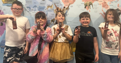 Photo of children showing Endangered Species Day learning