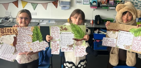 Photo of children showing Endangered Species Day learning