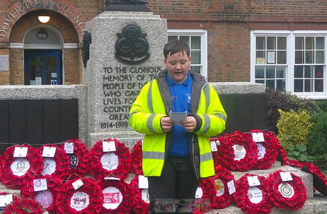 Photo of children laying wreaths