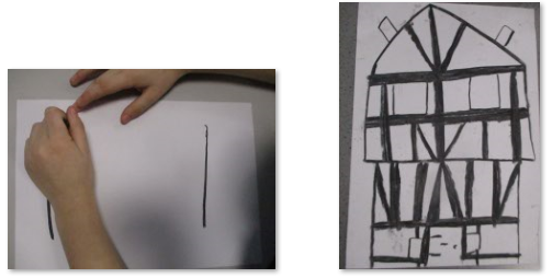 Photos of children's charcoal drawings of Tudor houses 