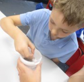 Photos of children making wormeries
