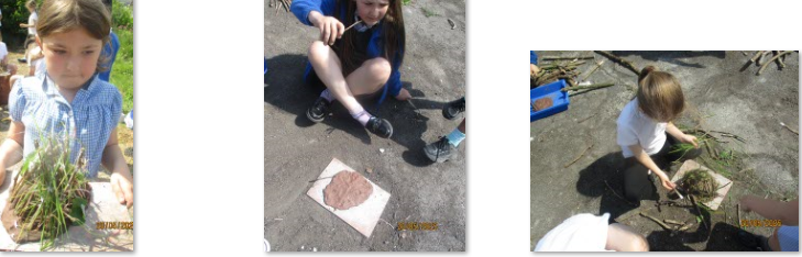 Photos of children building Neolithic houses