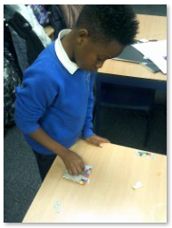 Photo of children making mosaics