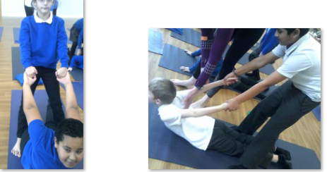 Photo of children doing yoga