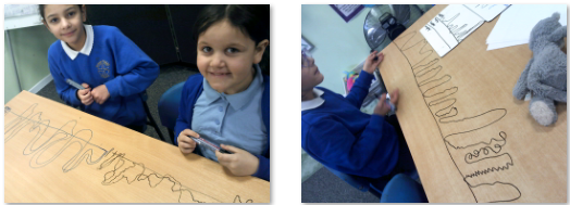 Photo of children drawing sound waves