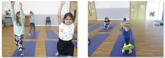 Photo of children doing yoga