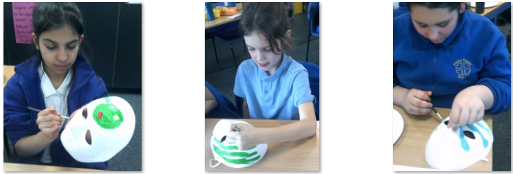 Photos of children painting masks