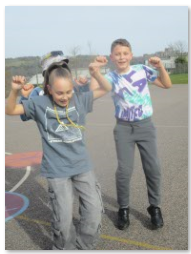 Photo of children dressed up and dancing for Comic Relief