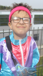Photo of children dressed up and dancing for Red Nose Day