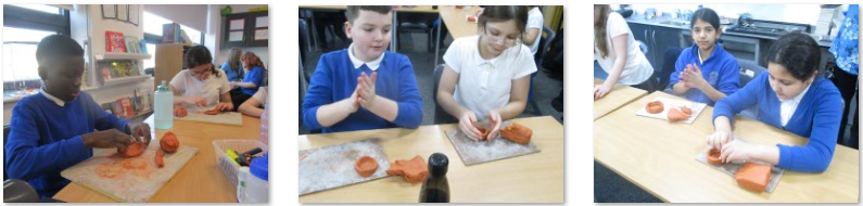 Photo of children making Mayan pots