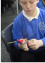 Pictures of child knitting