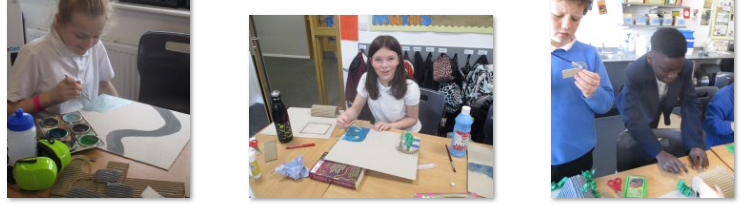 Photos of children building model Anderson Shelters