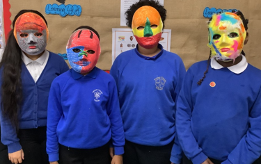 Photos of children making Greek monster masks