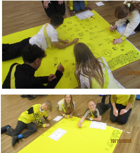 Photos of children adding to the school doodle