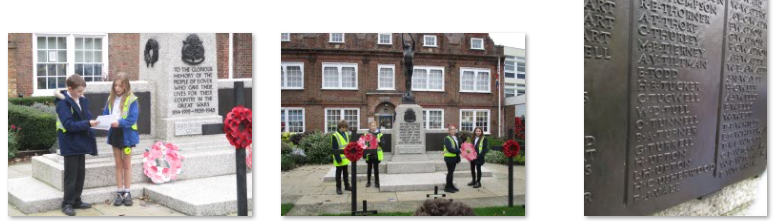 Photos of children laying wreath