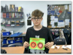 Photos of children showing / making artwork