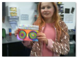 Photos of children showing / making artwork