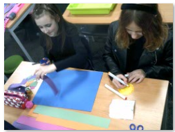 Photos of children showing / making artwork