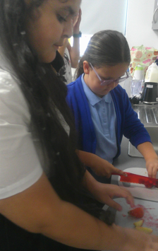 Photo of children making smoothies