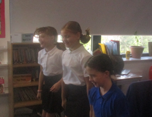 Photo of children doing exercise