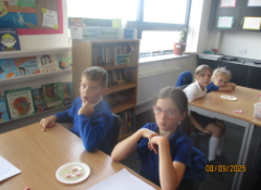 Photo of children doing blood experiment