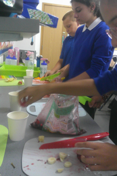 Photo of children making smoothies