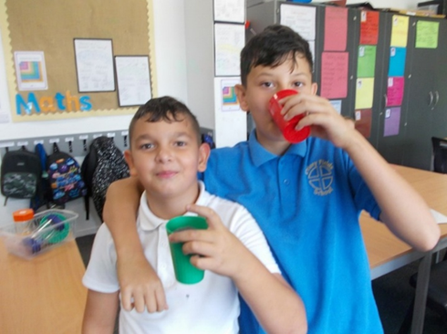 Photo of children tasting smoothies