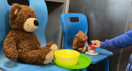 Photos of children placing chairs for teddies