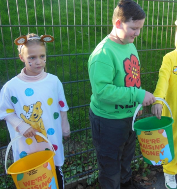 Image of children collecting for CIN