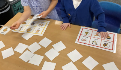 Photos of children playing body bingo