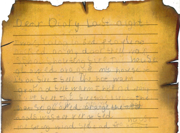 Photo of children's GFOL diary writing