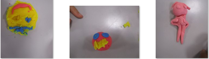 Photos of children's Playdoh models of emotions