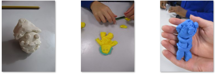 Photos of children's Playdoh models of emotions