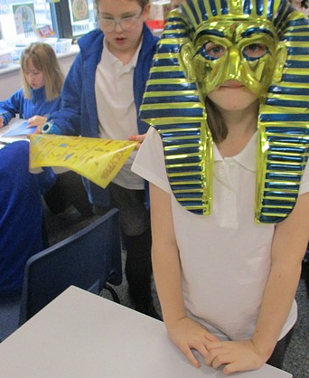 Photo of child dressed in Tutankhamen mask