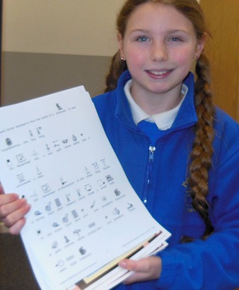 Photo of girl showing paper collecting